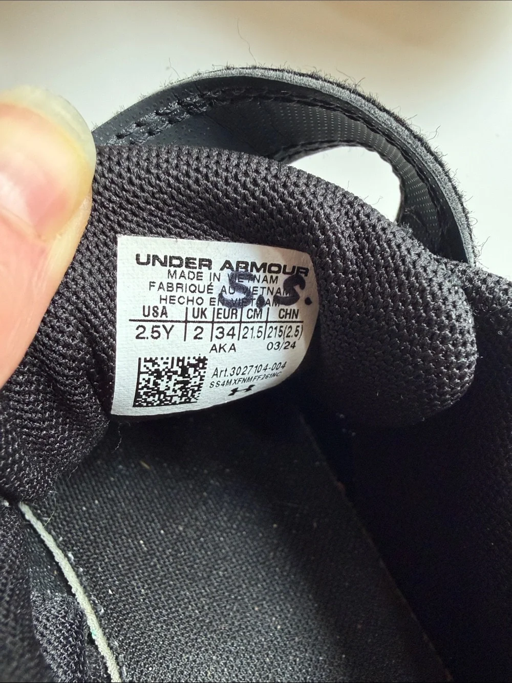 Under Armour Black and White Kids' Athletic Sneakers with Gold Logo